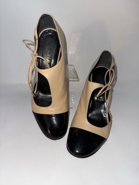CHANEL Beige and Black Mary Jane Leather Pumps with Tie Strap